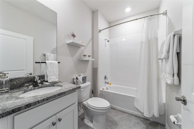 full bathroom with vanity, toilet, shower / bathtub combination with curtain, and tile patterned floors