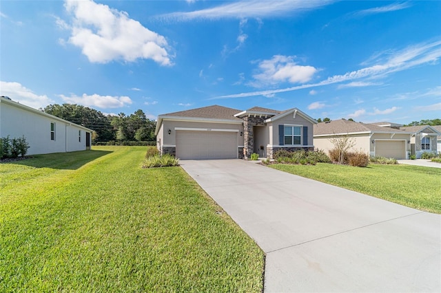 ranch-style home featuring a garage and a front lawn