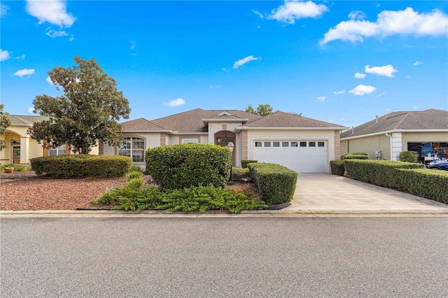 view of front of property featuring a garage