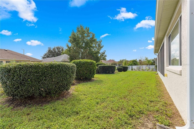 view of yard featuring fence