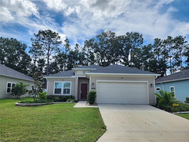 view of front facade featuring a garage and a front lawn