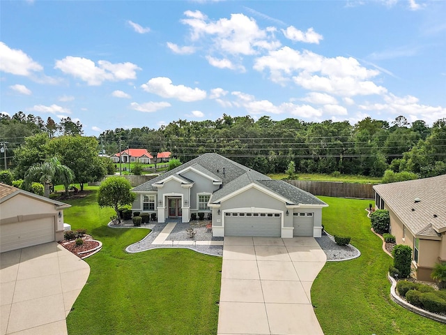 ranch-style house with a front yard and a garage