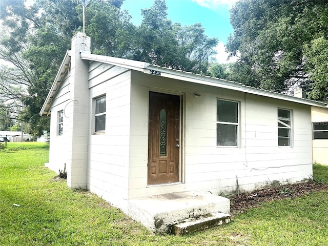 exterior space with a lawn