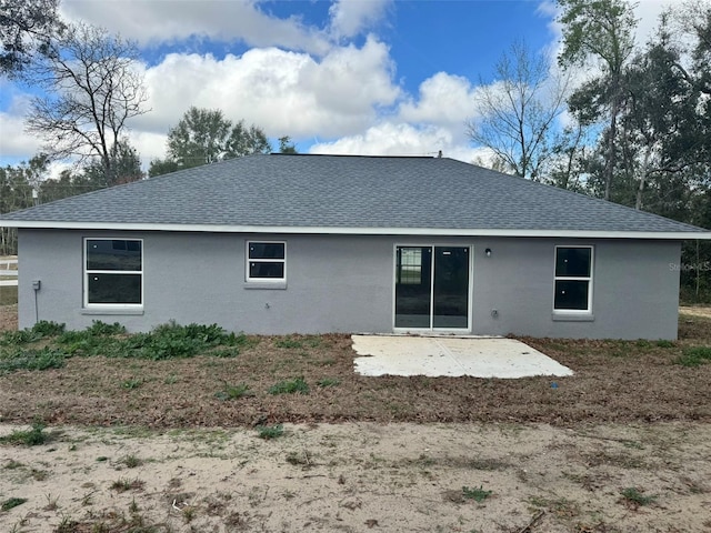 rear view of house with a patio