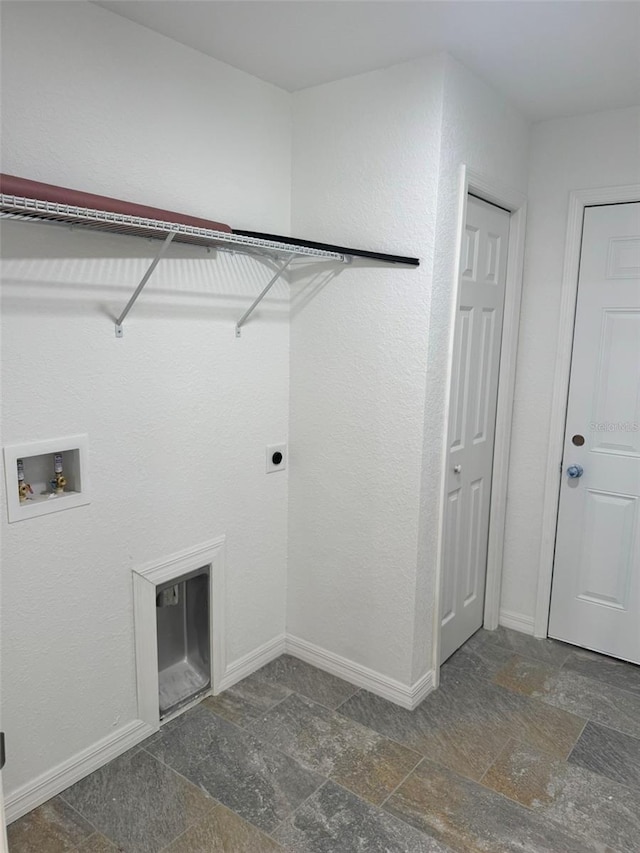 laundry area with hookup for an electric dryer and hookup for a washing machine