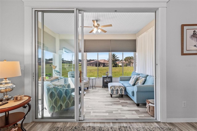 entryway featuring ceiling fan and light hardwood / wood-style flooring