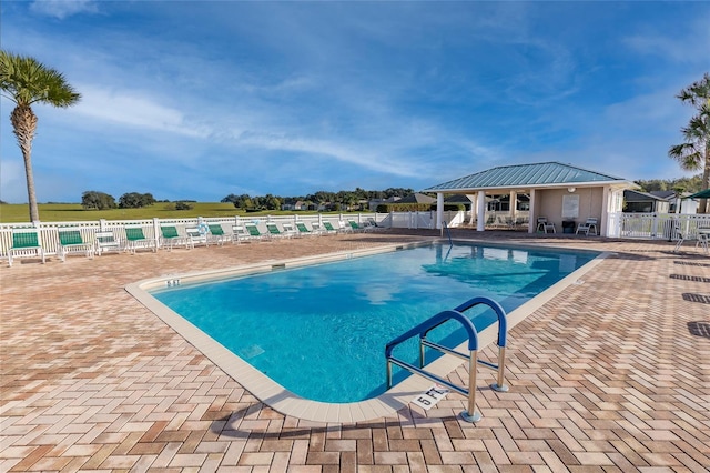 view of pool with a gazebo and a patio