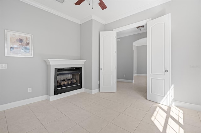 unfurnished living room featuring crown molding, light tile patterned flooring, and ceiling fan