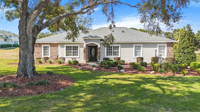 single story home with a front yard