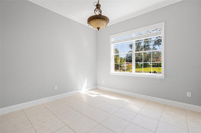 unfurnished room featuring crown molding and light tile patterned floors