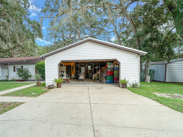 garage with a lawn