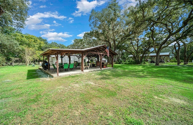 view of home's community featuring a gazebo and a yard