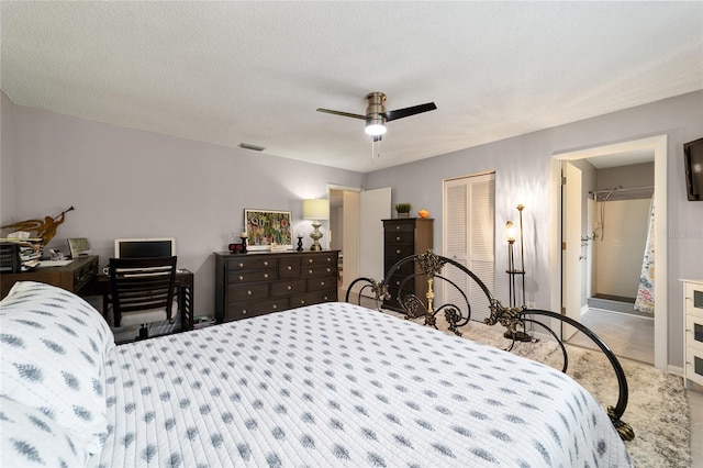 bedroom featuring a closet, ceiling fan, and a textured ceiling