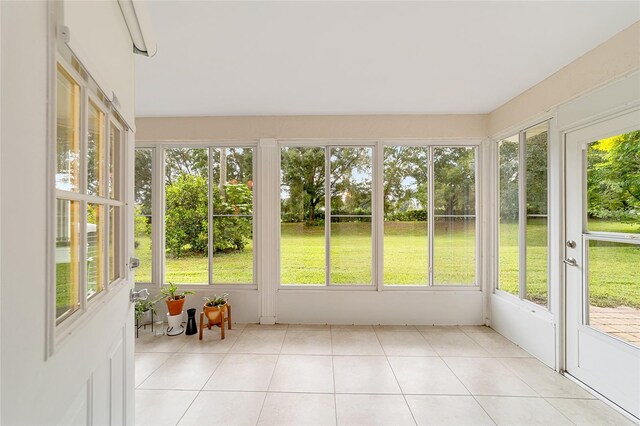 unfurnished sunroom featuring plenty of natural light