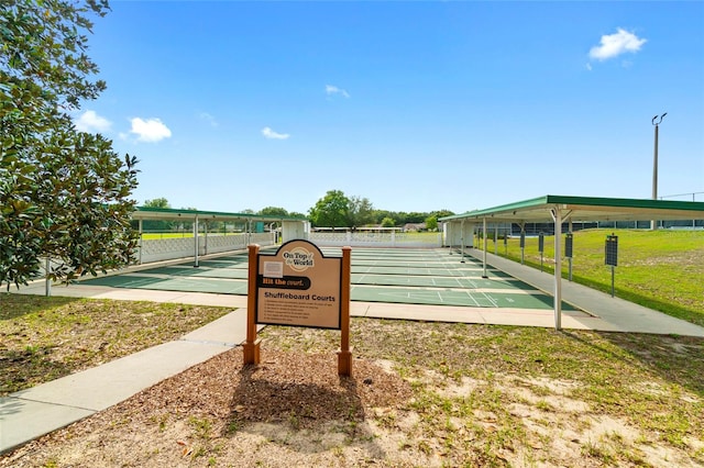 view of property's community featuring a lawn