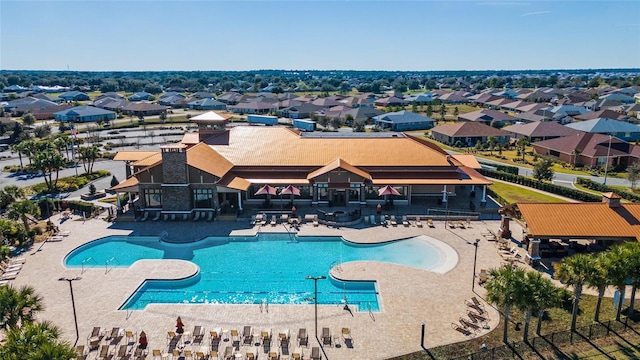 view of swimming pool with a gazebo and a patio area