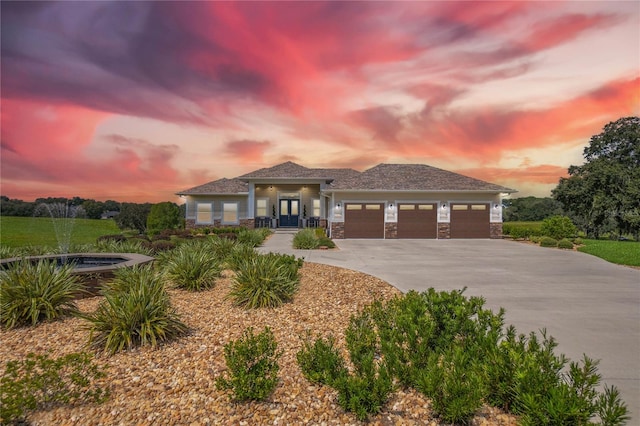 view of front of home with a garage