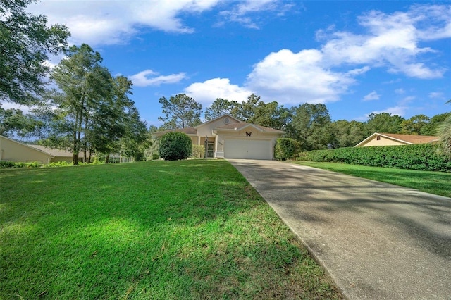 view of front of house featuring a garage and a front lawn