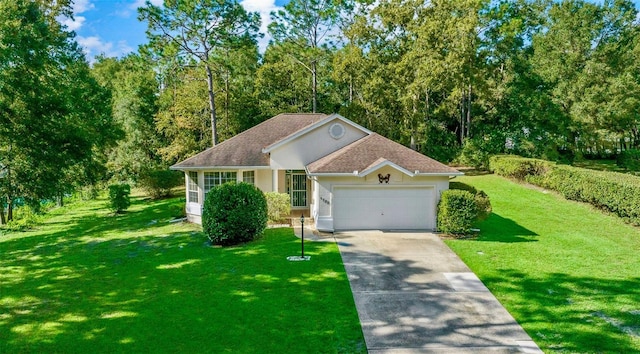 view of front facade featuring a garage and a front lawn