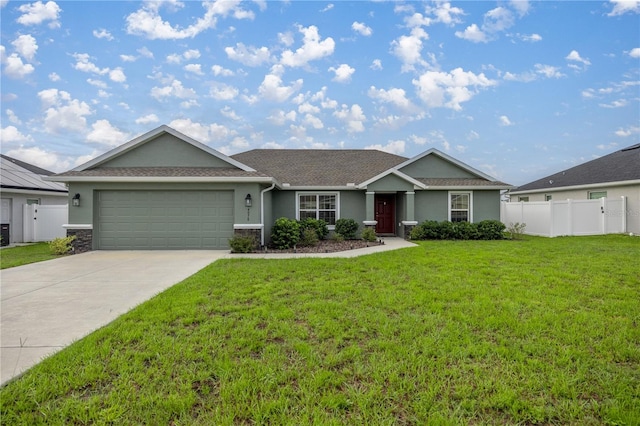 ranch-style house featuring a front yard and a garage