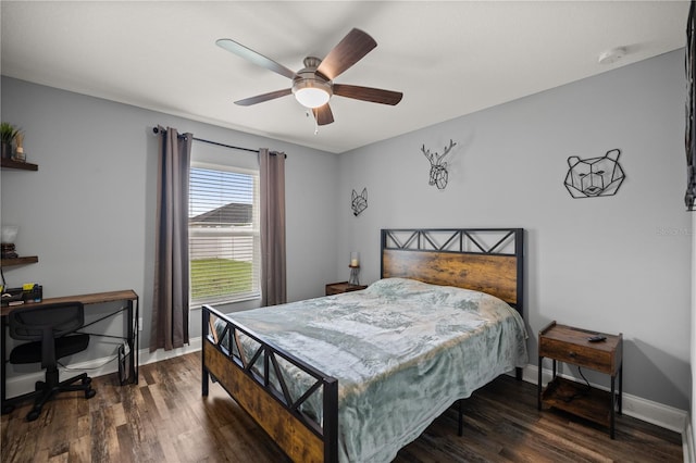 bedroom featuring ceiling fan and dark wood-type flooring