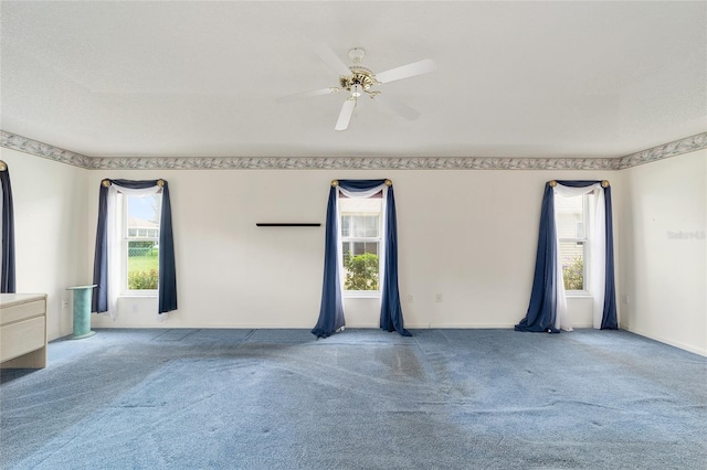 unfurnished room with light carpet and ceiling fan