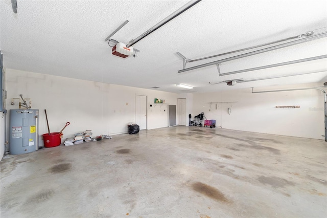 garage with water heater and a garage door opener