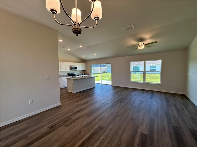 unfurnished living room with visible vents, dark wood finished floors, and baseboards