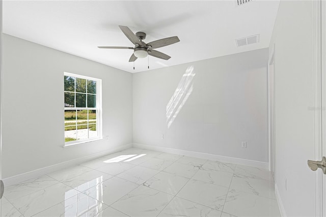 spare room featuring ceiling fan