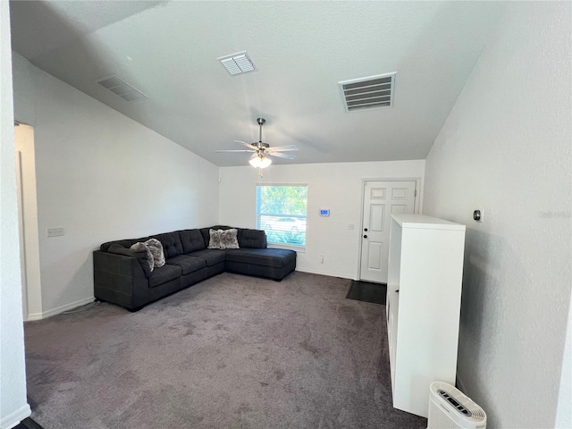 carpeted living room with ceiling fan and lofted ceiling