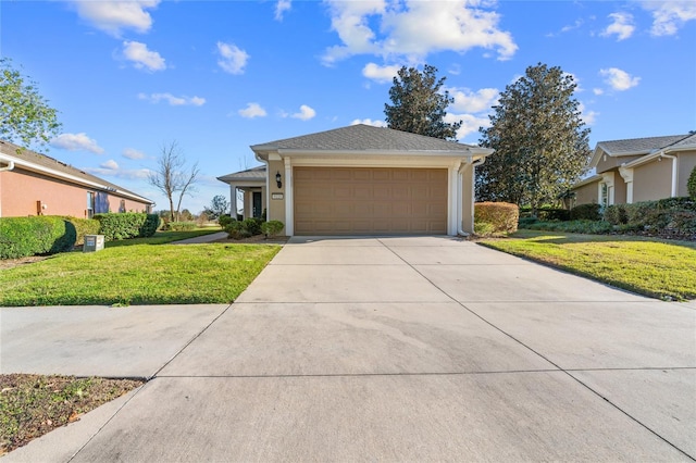 ranch-style house with a garage and a front lawn