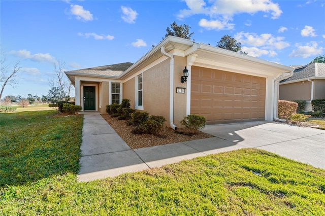 ranch-style home with a front yard and a garage