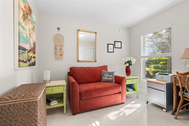 sitting room featuring light tile patterned flooring