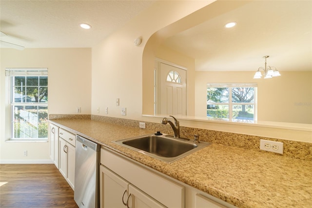 kitchen with dishwasher, pendant lighting, sink, and a wealth of natural light