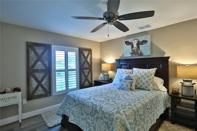 bedroom featuring ceiling fan and hardwood / wood-style floors