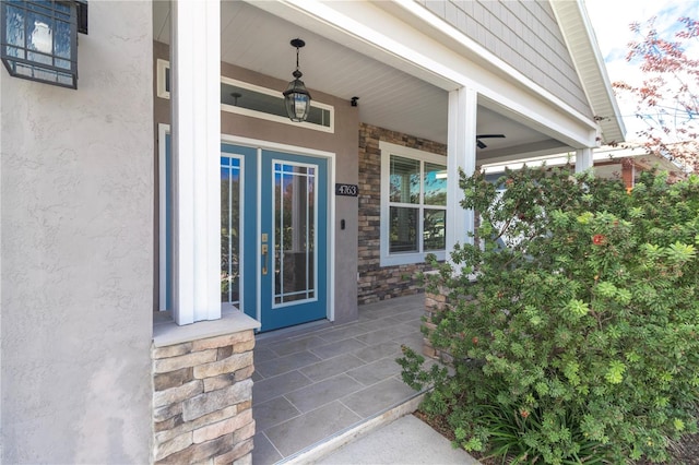 property entrance with covered porch