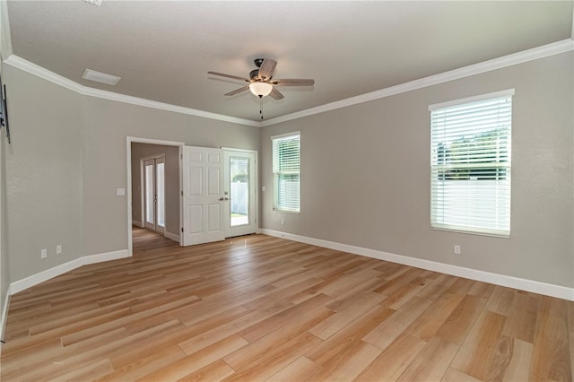 unfurnished room featuring ornamental molding, light hardwood / wood-style floors, and ceiling fan