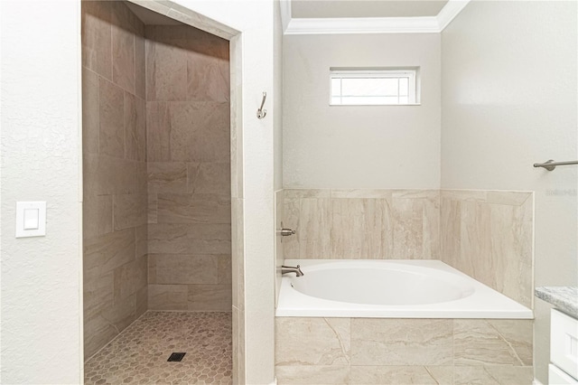 bathroom with ornamental molding, vanity, and separate shower and tub