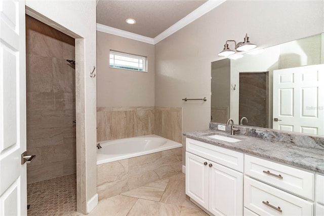 bathroom with plus walk in shower, ornamental molding, and vanity