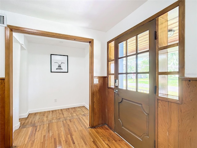 doorway to outside with light hardwood / wood-style flooring