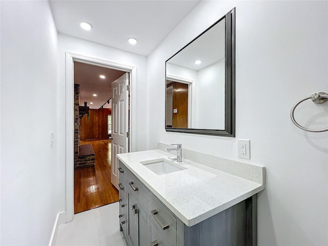 bathroom featuring vanity and hardwood / wood-style floors