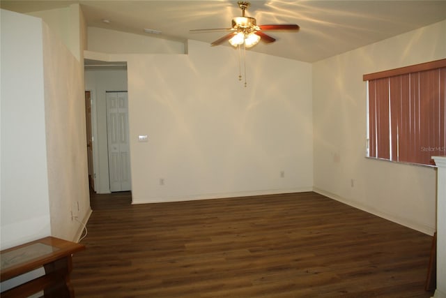 unfurnished room with dark hardwood / wood-style floors and ceiling fan