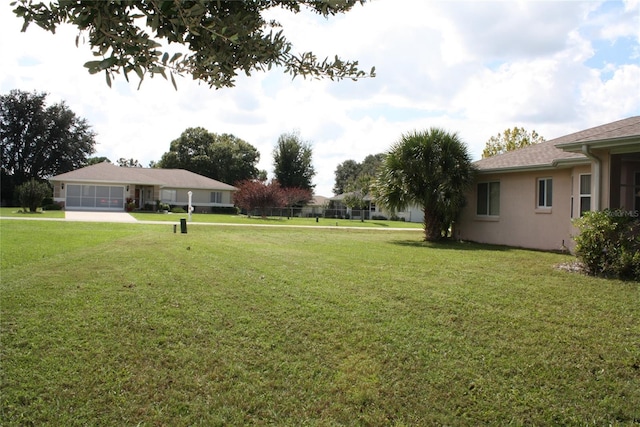 view of yard with a sunroom