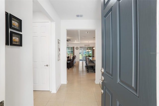 foyer entrance featuring light tile patterned floors