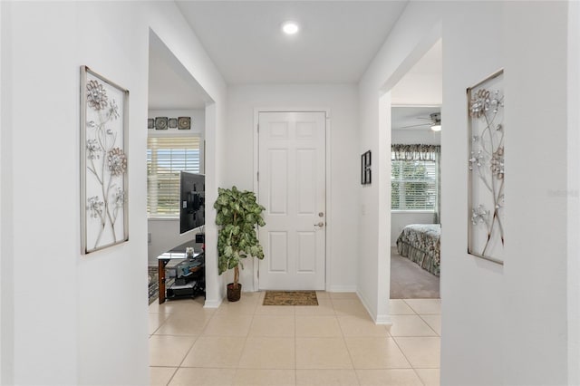 foyer featuring light tile patterned flooring