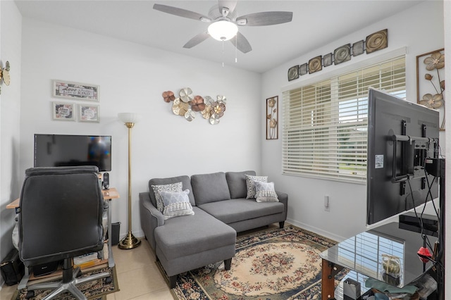 tiled office featuring ceiling fan