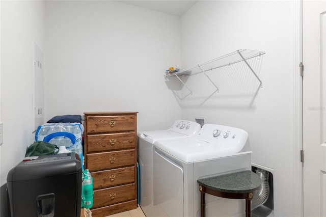 laundry area with washer and dryer