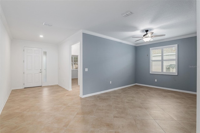 empty room with a textured ceiling, ceiling fan, light tile patterned floors, and crown molding