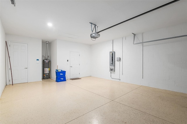 garage with water heater, electric panel, and a garage door opener