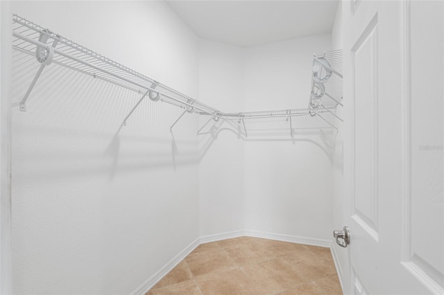 7709 SW 86th Ct, Ocala, FL 34481 - spacious closet with light tile patterned floors